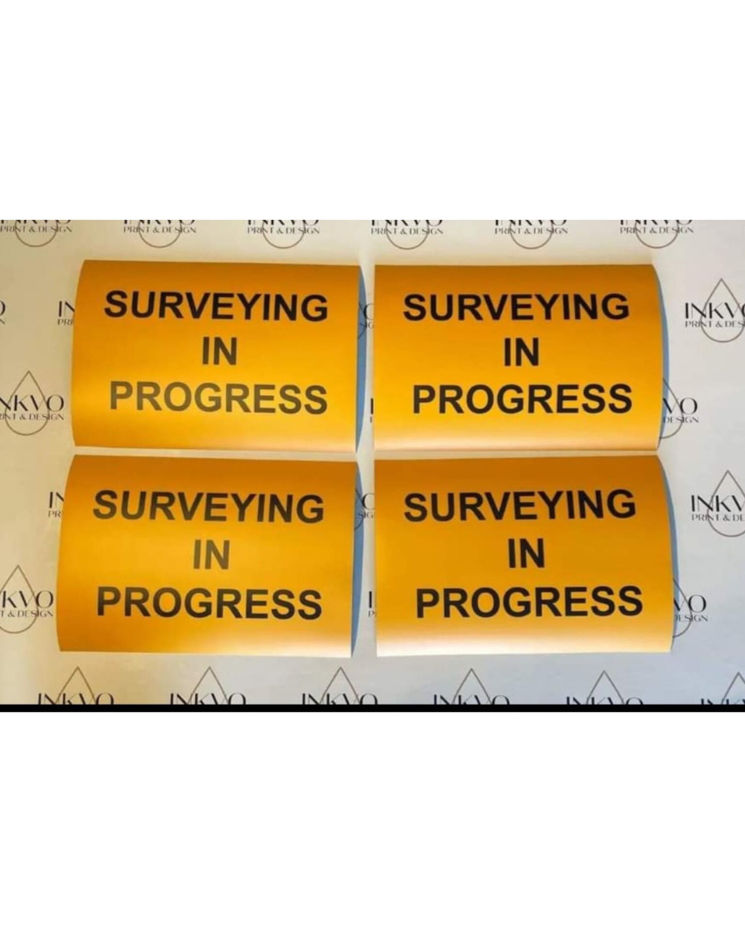 4 images of magnetic signs, with yellow background and the writing Surveying in progress