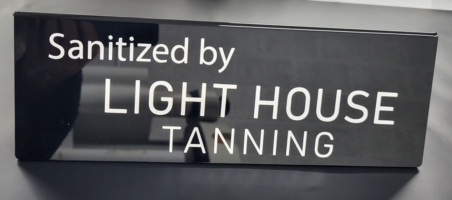 Sanitised by A folded sign